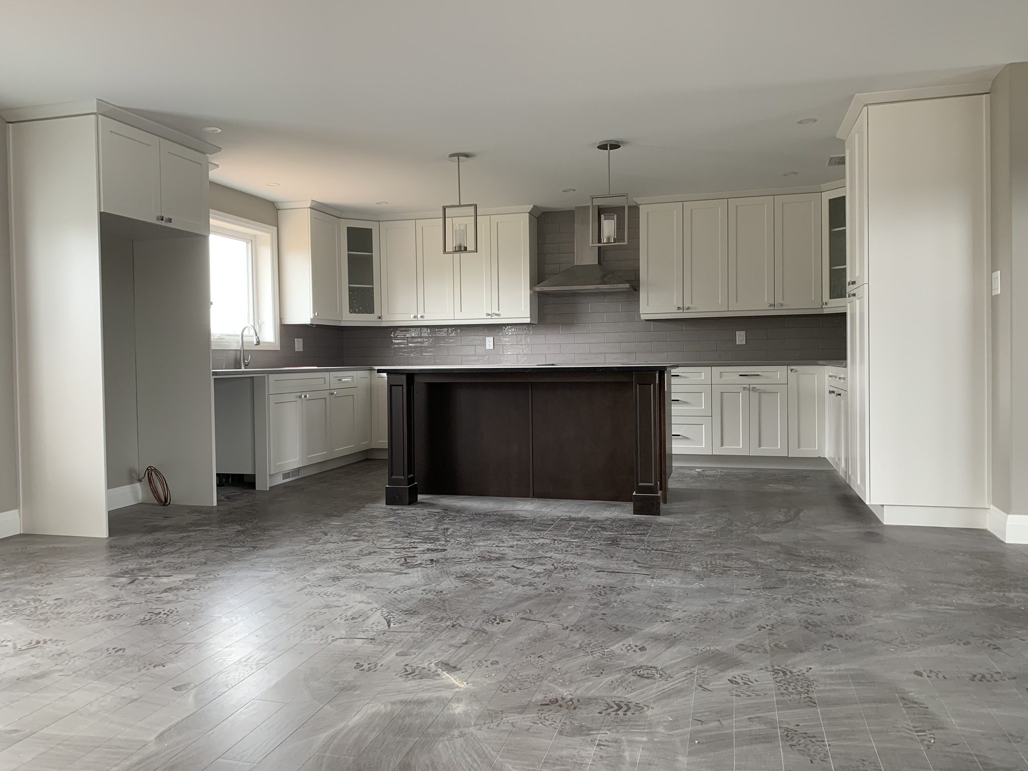 White kitchen with dark island